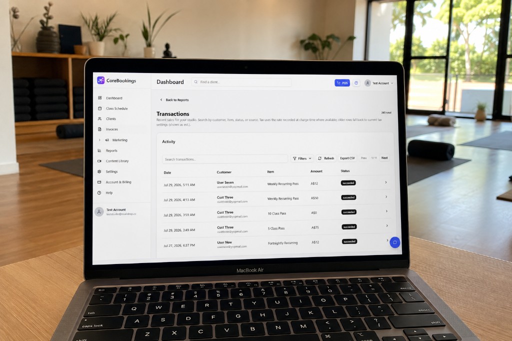 CoreBookings on a laptop in a yoga studio